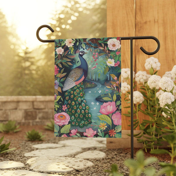 Decorative garden flag with a peacock design on a stand outdoors.