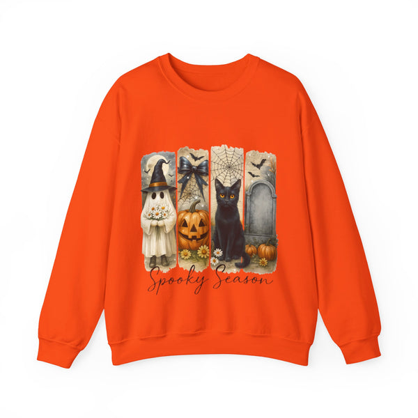 Orange sweatshirt with Halloween-themed design featuring a ghost, pumpkin, and black cat on a white background.