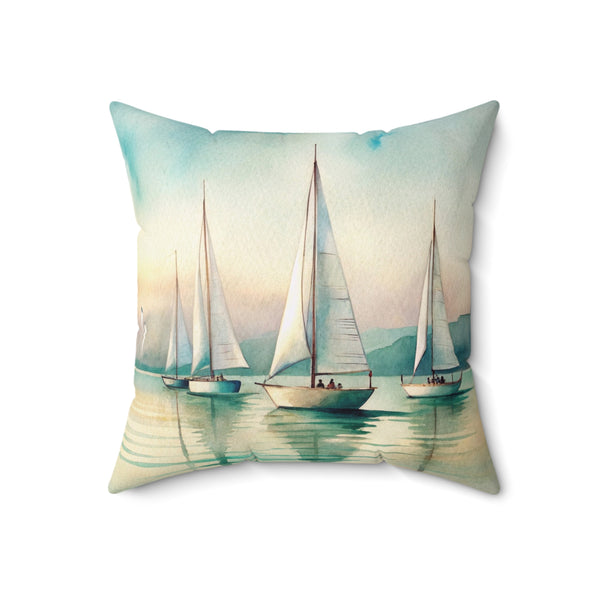 Decorative pillow with sailboat design on a white background