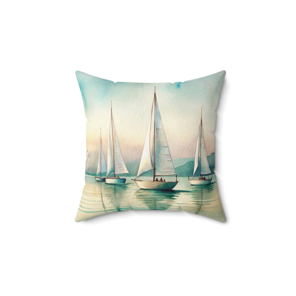 Decorative pillow with sailboat design on a white background