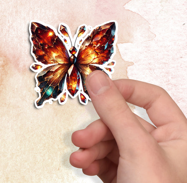 Butterfly-shaped sticker held by a hand on a textured beige background