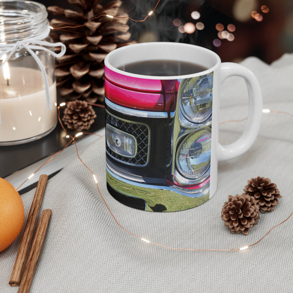 Pontiac GTO muscle car hot rod coffee mug on table with Christmas decorations.