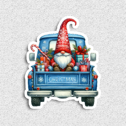 Sticker of a blue truck with a Christmas gnome and decorations on a textured gray background