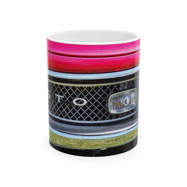 Colorful mug with a patterned design on a white background