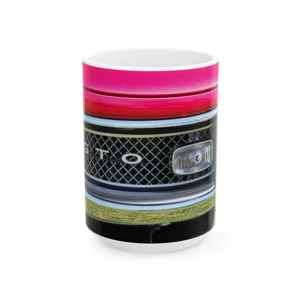Colorful mug with a patterned design on a white background
