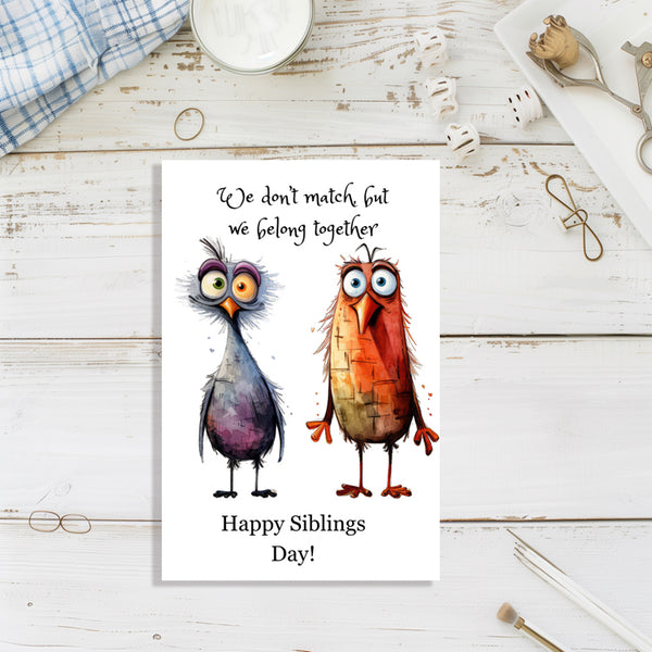 Handmade siblings day greeting card with colorful birds