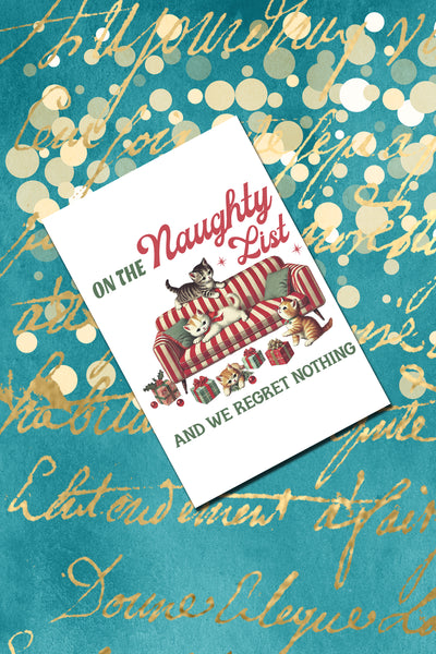 Card with cats on a couch and text 'Naughty on the List, and we regret nothing' on a decorative background.