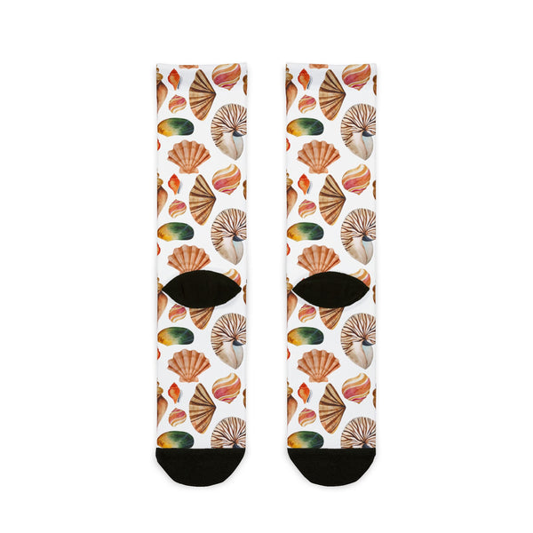 Pair of socks with shell pattern on a white background