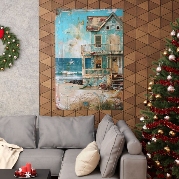 Living room with a gray sofa, Christmas tree, and decorative wall art.