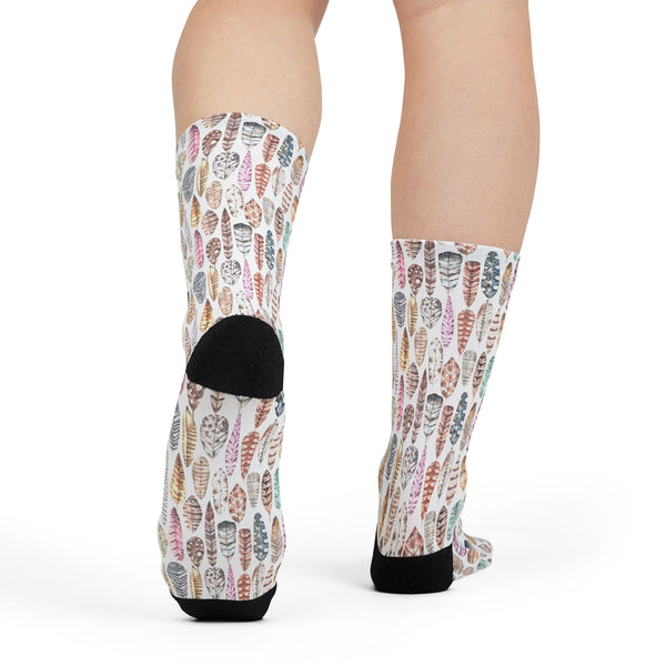 Patterned socks with black toes and heels on a white background