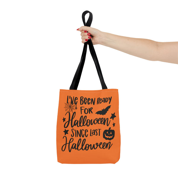 Ready for Halloween Trick or Treat Bag in a hand on a white background