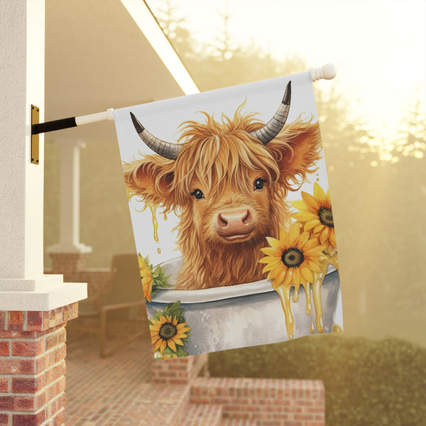 Decorative flag with a highland cow and sunflowers on a porch