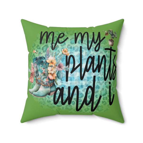 Green pillow with floral design, boots, and text 'me my plants and I' on a white background