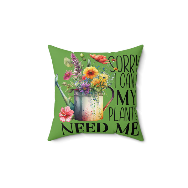 Decorative pillow with floral design and text on a green background