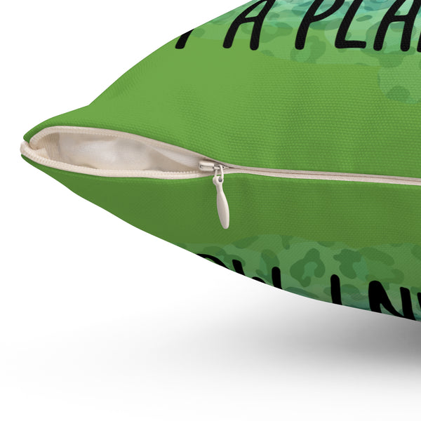 Green pillow with text on a white background