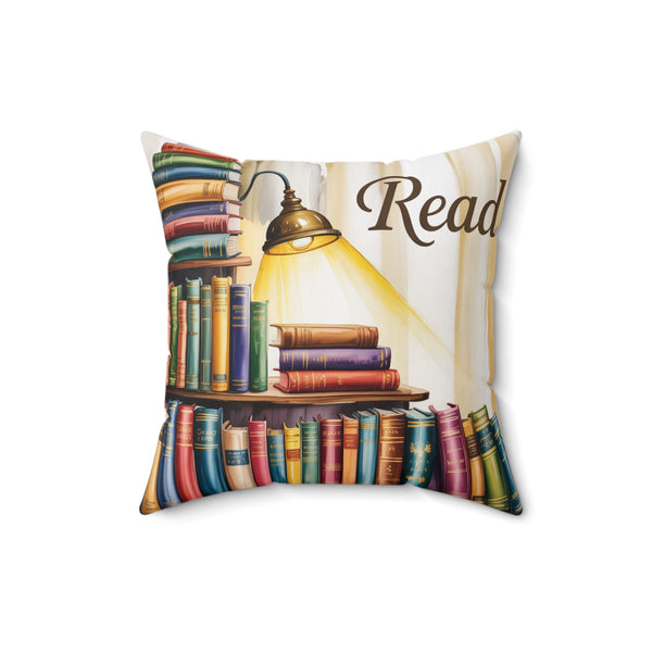 Decorative pillow with bookshelf design and 'Read' text on a white background