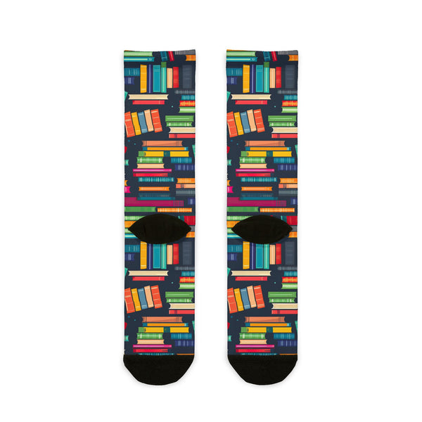 Colorful book-patterned socks on a white background