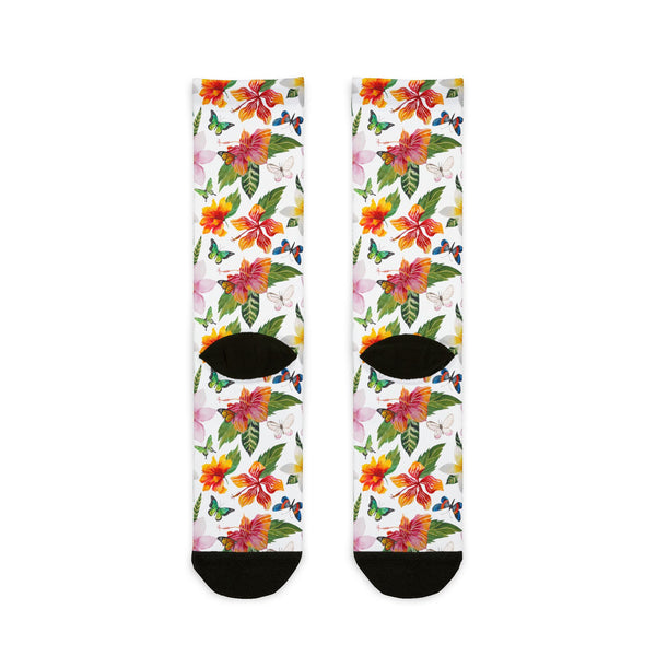 Pair of socks with colorful floral pattern on a white background