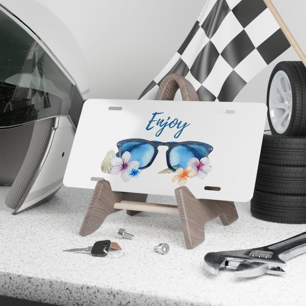 
Pretty plumeria and sunglasses beach front license plate