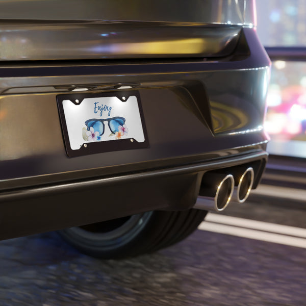 Pretty plumeria and sunglasses beach front license plate