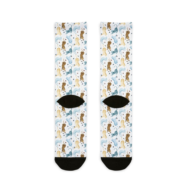 Pair of socks with a pattern of dogs on a white background