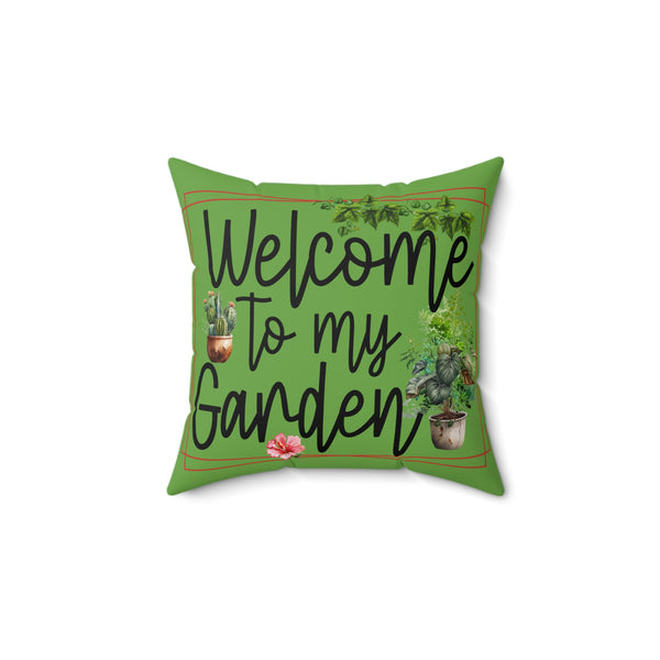 Green pillow with 'Welcome to my Garden' text and plant illustrations on a white background