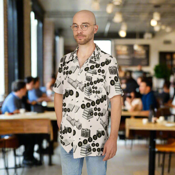 Man wearing a patterned shirt with a white background