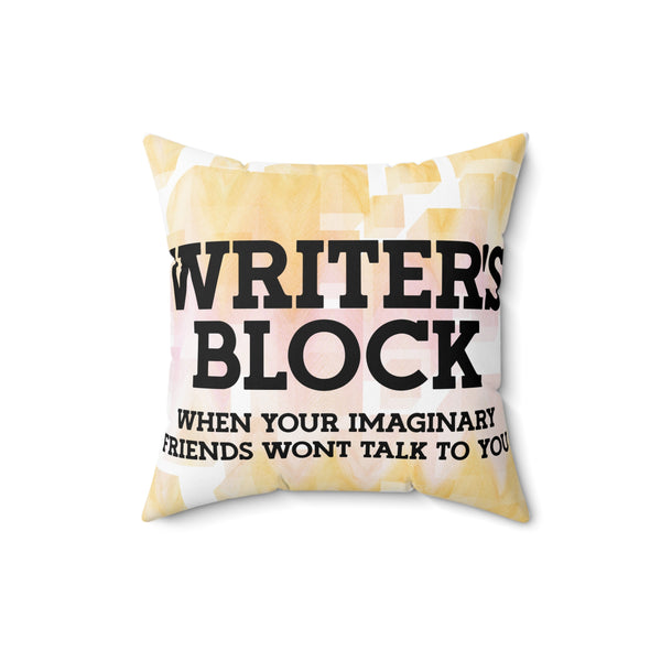 Pillow with text 'WRITER'S BLOCK WHEN YOUR IMAGINARY FRIENDS WON'T TALK TO YOU' on a white background